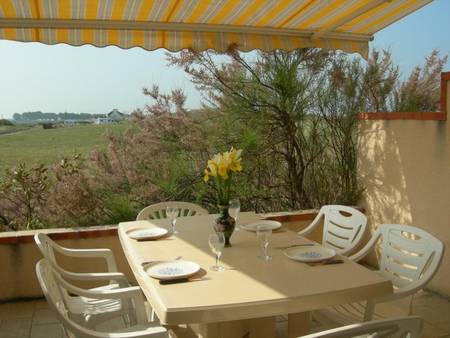 Appartement plein sud à Penthièvre plage les pieds dans l'eau.